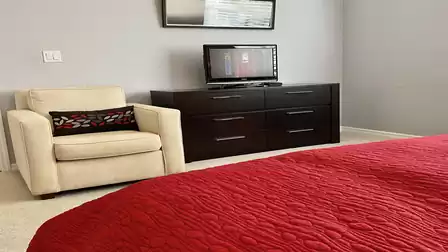 A comfortable armchair in the bedroom so you can relax in peace and quiet