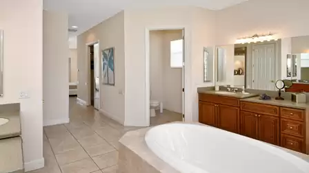 Bathtub, bathroom sink and separate toilet. Everything is there.