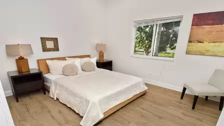 Second bedroom with a great view of the garden and the canal