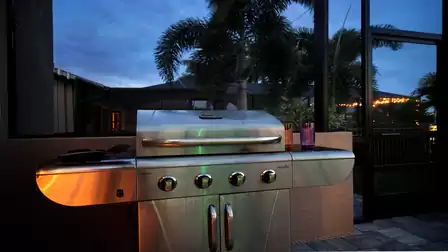 High-quality stainless steel gas grill on the terrace of Villa Elvenar, perfect for cozy barbecue evenings.