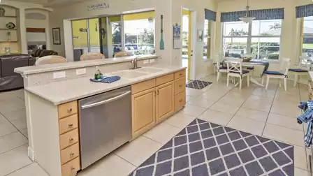 Here you can do both - wash dishes and watch TV