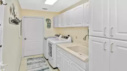 Utility room with washer and dryer