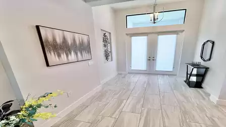 Bright entryway with modern decorative elements.