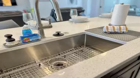 Close-up of the sink with modern fixtures.