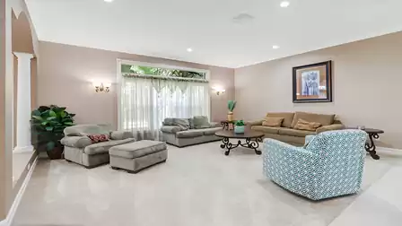 Spacious living room with comfortable seating and stylish design.