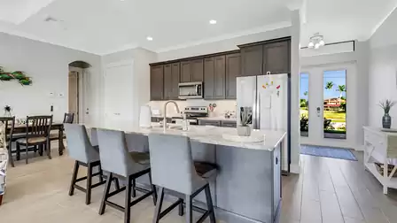 The kitchen welcomes you with an ultra-modern counter for 3 people