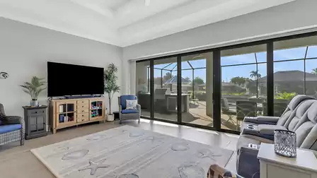 Light-flooded TV area with cinema ambience