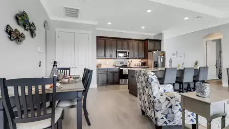 Large, open-plan living area with kitchen and dining table
