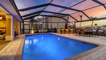 Evening atmosphere on the illuminated terrace and pool