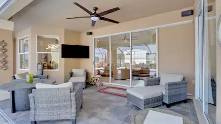 Read a good book in the shade of the covered terrace or watch your favorite sports show.