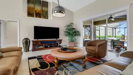 Large sliding glass doors open onto the terrace