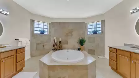 Bathroom with freestanding bathtub, large walk-in shower and 2 sinks
