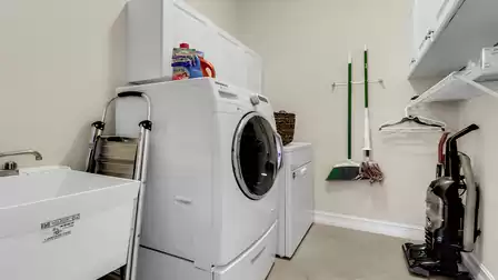 Utility room with washer and dryer