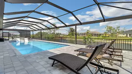 Comfortable loungers by the pool invite you to relax