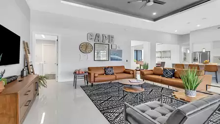 Open living room with elegant leather furniture