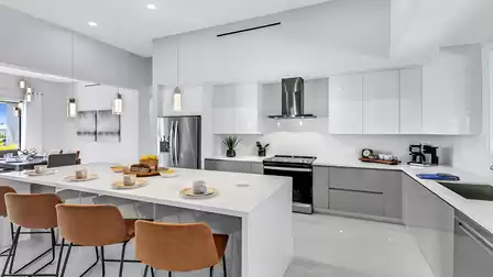 Complemented by an inviting kitchen counter with space for four people