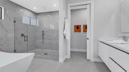 The spacious walk-in shower becomes an experience