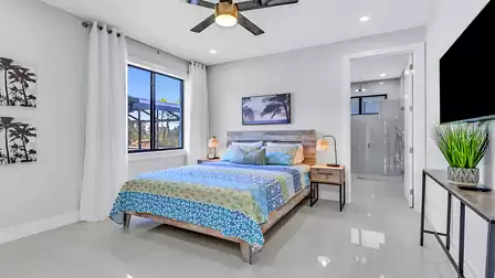 Bedroom with double bed and en-suite bathroom