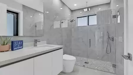 Third bathroom, which is also equipped with a modern walk-in shower