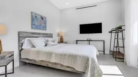 A queen size bed also awaits you in the fourth bedroom