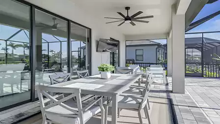 The stylish dining table is perfect for snacks, drinks or an outdoor breakfast together