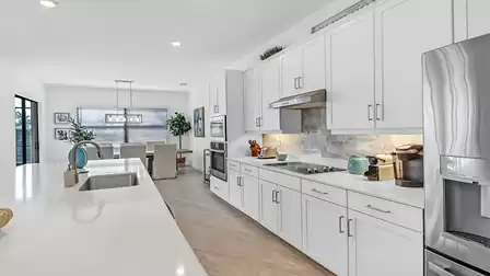 The ultra-modern kitchen impresses with its innovative equipment