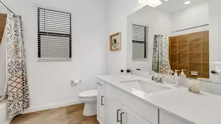 The third bathroom offers a bath/shower combination, sink, WC