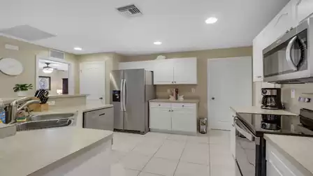 Modern kitchen with ample counter space and full amenities.