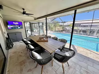The outdoor terrace offers space for up to 10 people