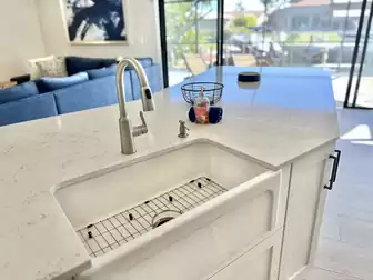 Sinks with a view of the terrace and living room