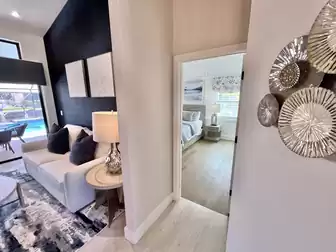 View of the wonderfully bright master bedroom