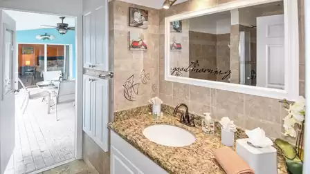 From the second bathroom you have direct access to the pool