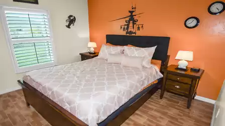 Modern designed third bedroom with queen size bed