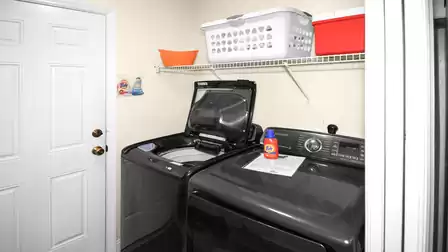 There is a washer and dryer in the utility room