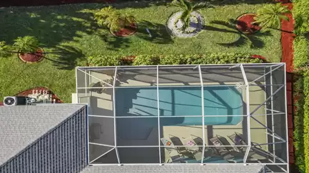 Private pool with screen, surrounded by a tropical secluded garden