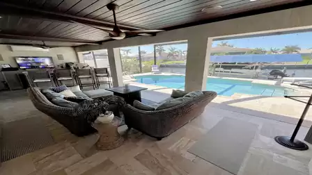 The spacious covered terrace allows you to enjoy the fresh air and nature