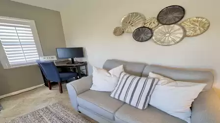 Stylish sofa that harmoniously combines with a functional workspace