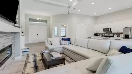 The living area impresses with an inviting sofa area