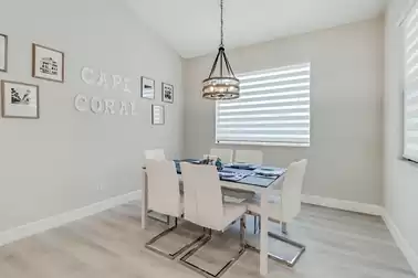 A spacious dining table offers space for six guests.