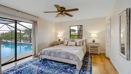 Large windows flood the room with natural light