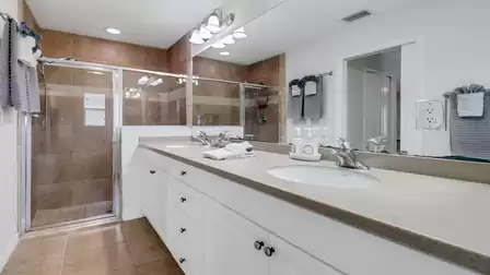 Modern bathroom with spacious walk-in shower and double vanity