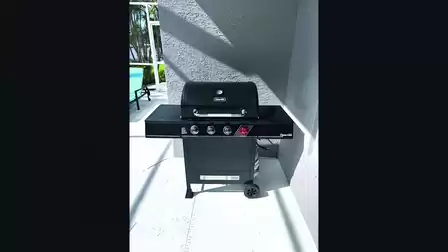 Modern gas grill on the terrace - ideal for open-air barbecue evenings.