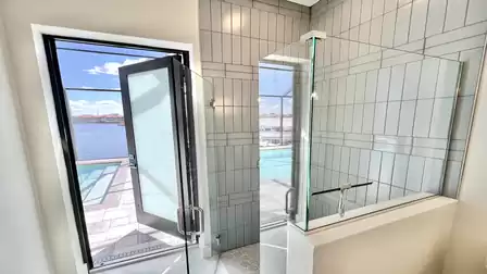 Direct access from the bathroom to the pool deck - perfect after a swim.