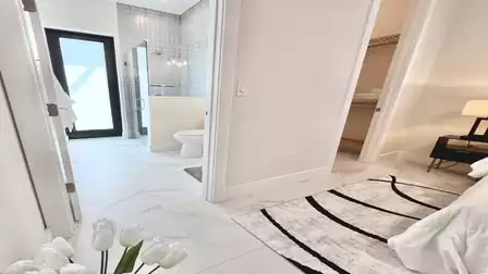 View from the bedroom to the entrance area and the closet