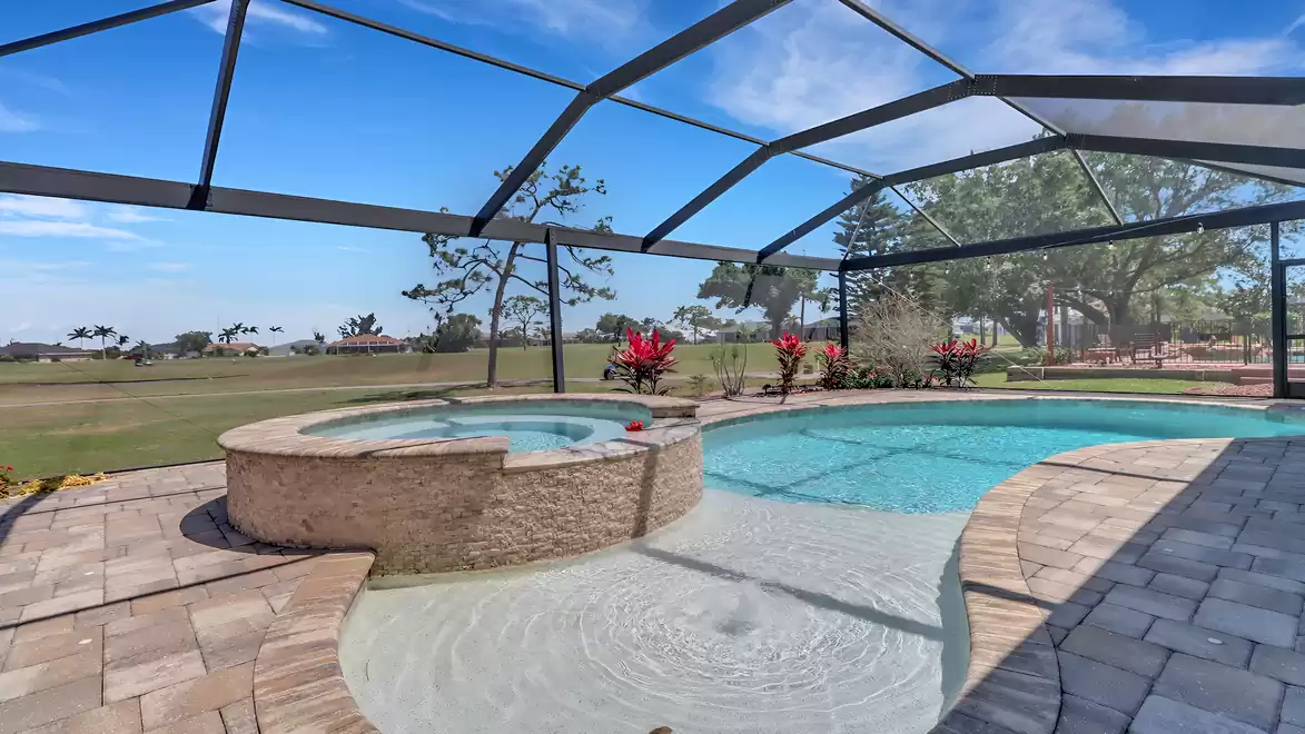 The heated pool with integrated spa invites you to relax