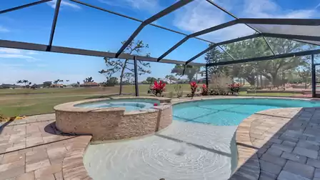 The heated pool with integrated spa invites you to relax