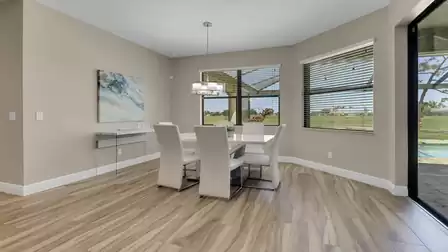 The elegant dining area invites you to enjoy relaxed meals and convivial evenings