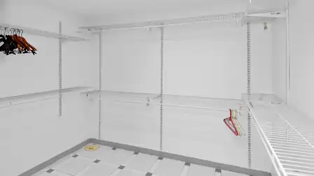 Walk-in closet with ample space and convenient shelving options