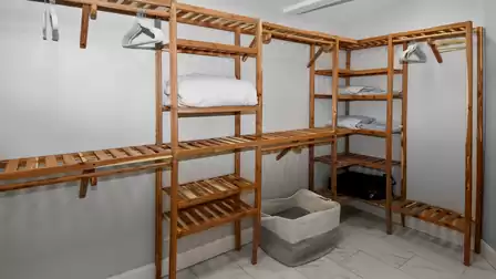 Spacious walk-in closet with plenty of room for clothes and luggage – perfect for longer stays.