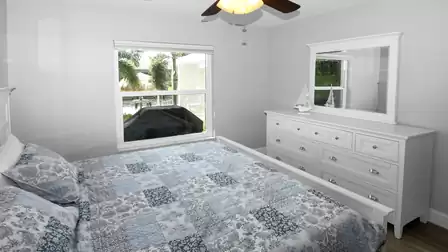 Bright bedroom with window view of the canal - charming and inviting.